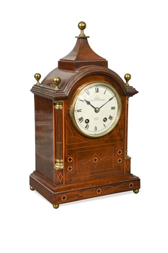 Lot 292 - A mahogany and inlaid mantel clock by Dent, 20th century