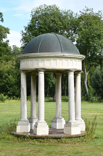 Lot 540 - A painted fibreglass classical temple