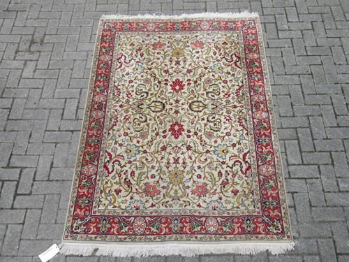 Lot 639 - A finely-woven Kashan rug, 212 x 142 cm