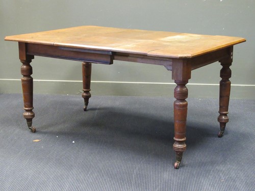 Lot 575 - An Victorian oak extending dining table 72 x...