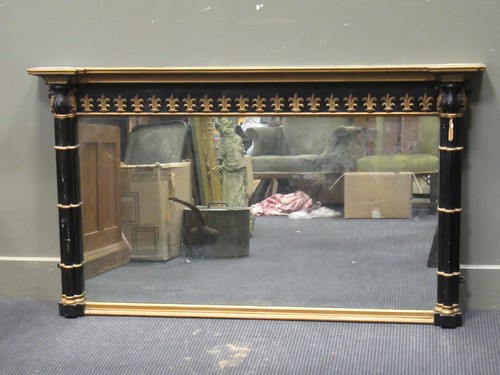 Lot 610 - A landscape overmantel mirror with cluster...