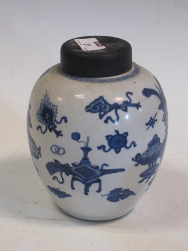 Lot 31 - A Kang Hsi blue and white jar (A/F) 18cm high