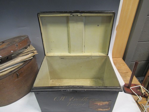 Lot 93 - A desk top writing slope, an oval tin hat box...
