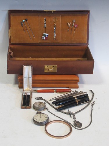 Lot 253 - A small collection of watch chains, a silver...