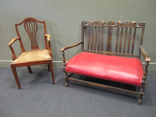 Lot 588 - A two seater bench with carved double coronet...