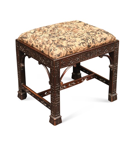 Lot 453 - A mahogany stool in the Chippendale manner