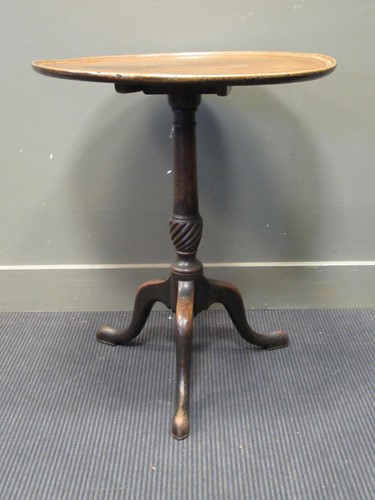 Lot 572 - A George III occasional table, the dished top...