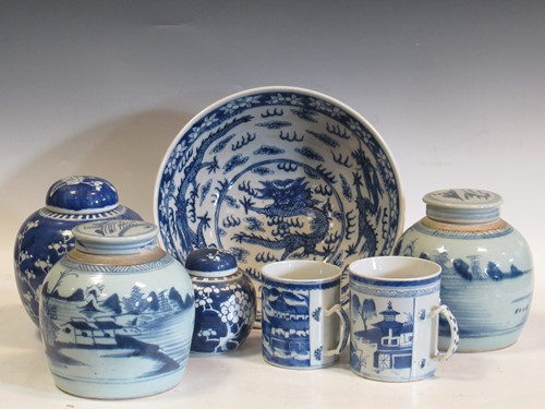 Lot 49 - Two Chinese blue and white export tankards;...