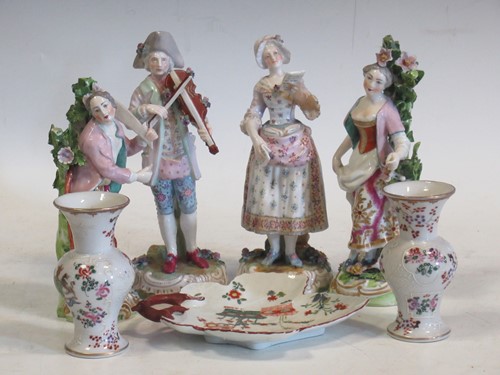 Lot 54 - A pair of continental porcelain figurines, two...