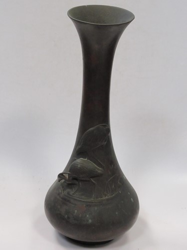 Lot 47 - A Japanese bronze vase decorated with a pair...