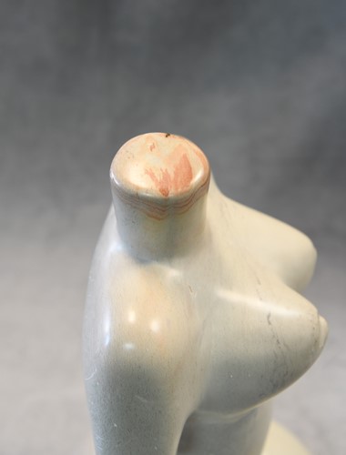 Lot 84 - A carved hardstone model of a female nude