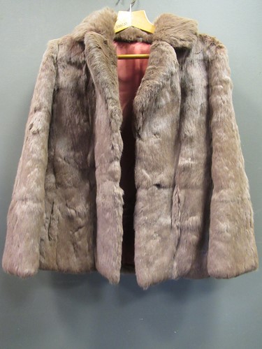 Lot 151 - A fur shruglet together with a short fur coat...