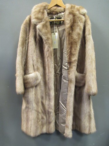 Lot 148 - A three quarter length satin lined fur coat...