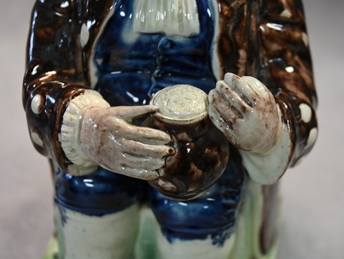 Lot 186 - A rare Whieldon Toby jug, circa 1780