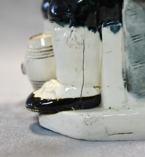 Lot 181 - A Staffordshire Toby jug, circa 1800