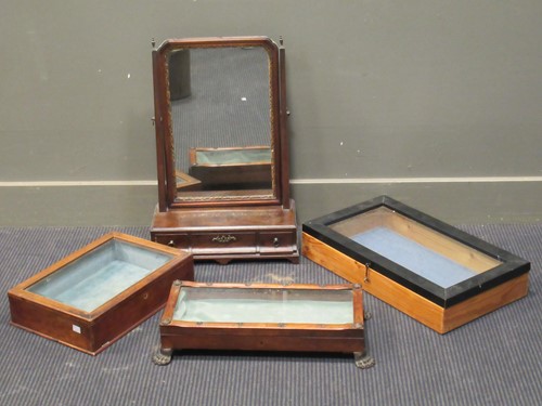 Lot 585 - A table top display cabinet raised on cast paw...