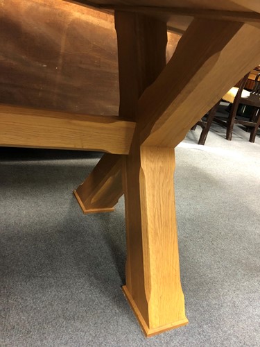 Lot 501 - An oak refectory table, modern
