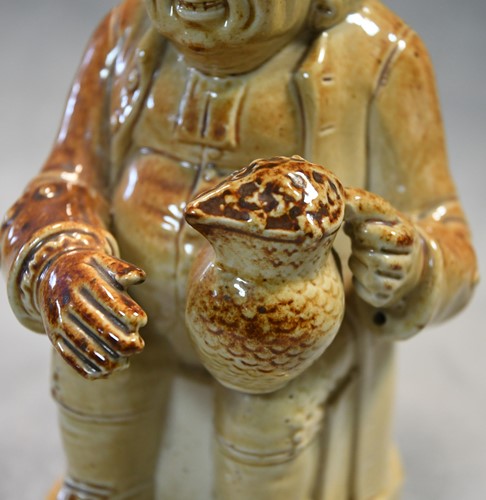 Lot 183 - A Brampton salt glazed Toby jug and lid, circa 1840
