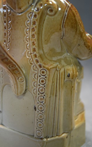 Lot 183 - A Brampton salt glazed Toby jug and lid, circa 1840