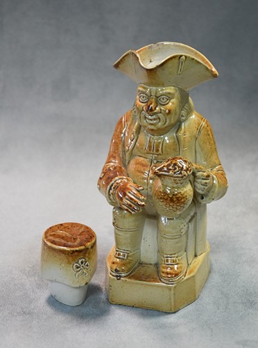 Lot 183 - A Brampton salt glazed Toby jug and lid, circa 1840
