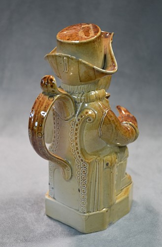 Lot 183 - A Brampton salt glazed Toby jug and lid, circa 1840