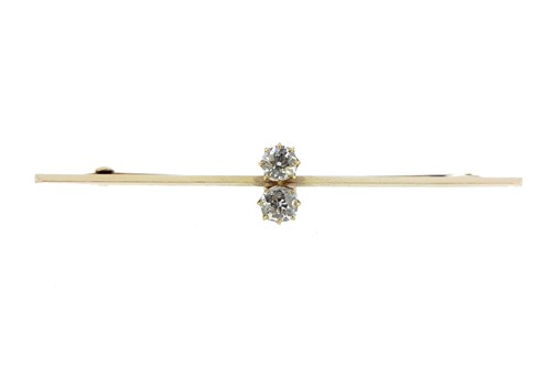 Lot 37 - A two stone diamond bar brooch