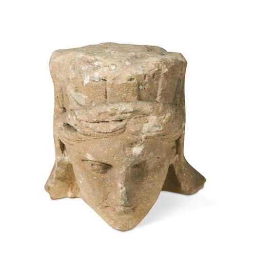 Lot 723 - A carved sandstone female head, possibly French, 18th or 19th century