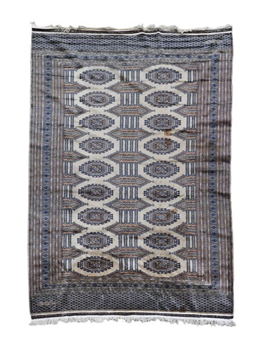 Lot 557 - A signed Bokhara carpet