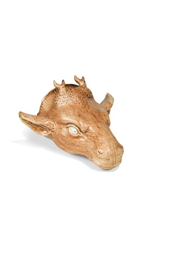 Lot 221 - A Staffordshire creamware stag's head stirrup cup, late 18th century