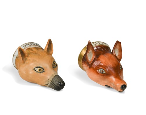 Lot 213 - Two Staffordshire fox head stirrup cups, 19th century