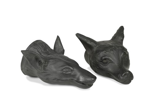 Lot 225 - Two black basalt fox head stirrup cups, probably Wedgwood