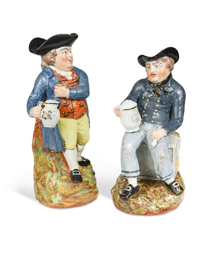 Lot 185 - A Staffordshire pearlware Toby jug, 19th century