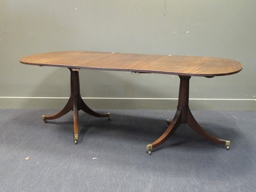 Lot 499 - A George III style mahogany twin pedestal...