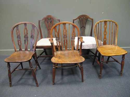 Lot 548 - A Victorian yew wood elbow Windsor type chair,...