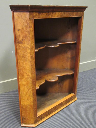 Lot 496 - A 19th century walnut splay front hanging...