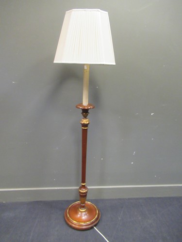 Lot 504 - A 20th century mahogany and gilt standard lamp...