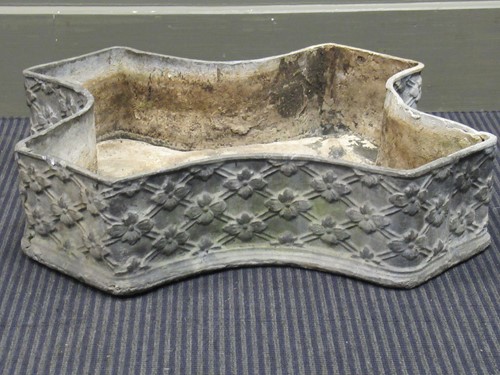 Lot 622 - A shallow lead panter of cruciform shape 53cm...