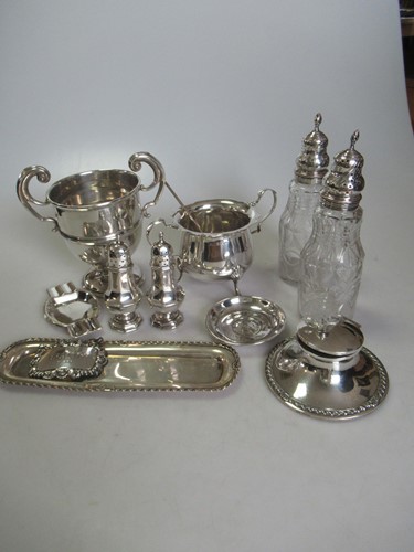 Lot 228 - A collection of silver including a mote spoon,...
