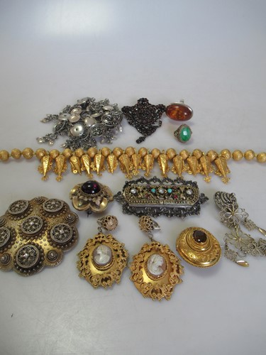 Lot 201 - An Indian wax filled bead necklace, tested as...