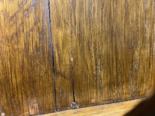 Lot 218 - Liberty & Co., an Arts & Crafts oak 'Caxton' magazine rack, circa 1904