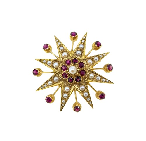 Lot 27 - A ruby and pearl star brooch