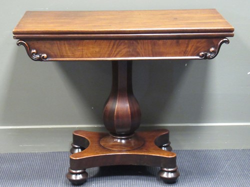 Lot 495 - Circa 1840 a mahogany fold over swivel top...