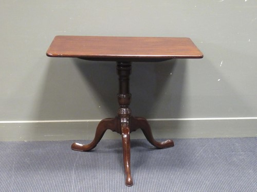 Lot 460 - A George III mahogany tilt top tripod table on...