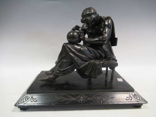 Lot 130 - Spelter figure of the Geographer, on wooden base.