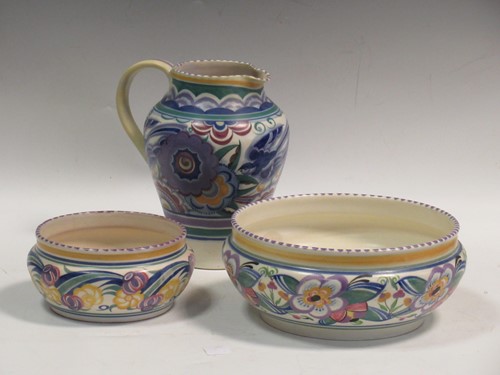 Lot 21 - A Poole pottery 1930's jug and two bowls