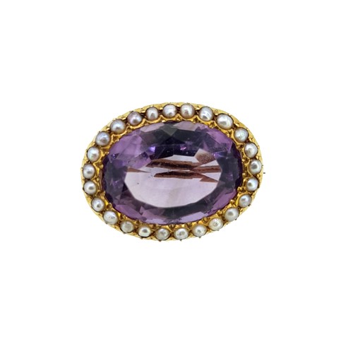 Lot 117 - A Victorian amethyst and seed pearl brooch/pendant