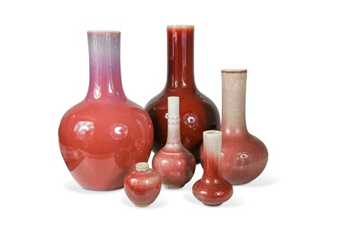 Lot 13 - A group of six Chinese sang-de boeuf glazed vases, 19/20th century