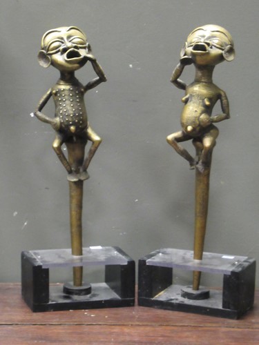 Lot 166 - A North West African pair of bronze figures of...
