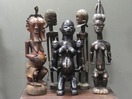 Lot 163 - A Songye double faced figure 90.5cm high, a...