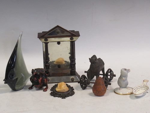 Lot 99 - A mirrored tabernacle, a carved medalion of a...